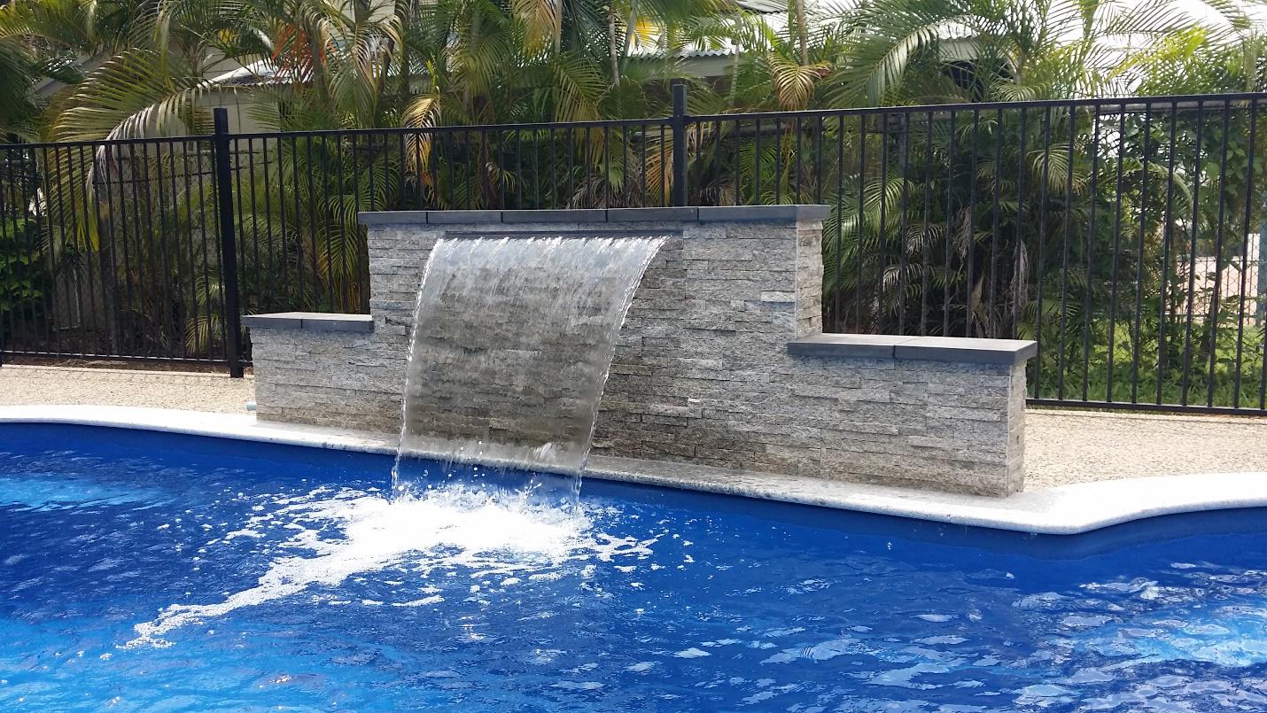 Pool with water feature — Darwin Fibreglass Pools & Spas In Winnellie, NT