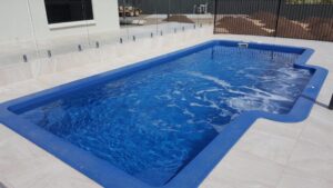 Large Fibreglass Pool with Glass Balustrades in Darwin NT
