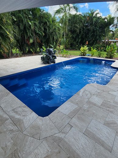 Swimming Pool With An Elephant Fountain — Darwin Fibreglass Pools & Spas In Winnellie, NT